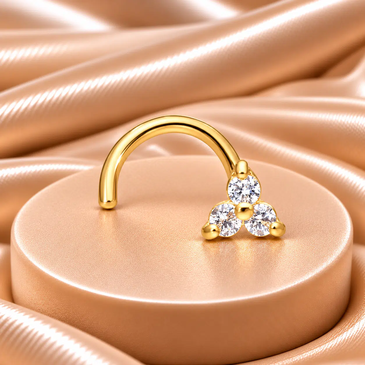 18 Karaats Gouden gebogen neuspiercing met jewelled Trinity top